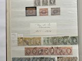 an open book with a lot of different stamps on it