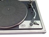 a turntable that is sitting on top of a table