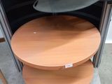 a wooden table with a metal tray on top of it
