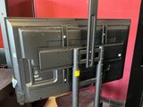 a picture of a flat screen tv sitting on top of a stand