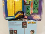 two boxes of toys that are sitting on a table