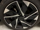 a close up of a wheel on a car