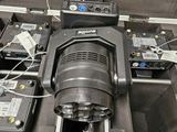 a machine that is sitting inside of a metal case