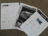 several papers are sitting on the ground next to each other