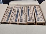 several boxes are stacked on top of each other in a cardboard box