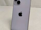 an apple iphone is sitting on a table with a white background