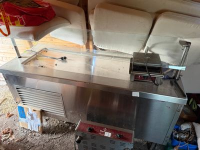an image of a kitchen that is under a tent