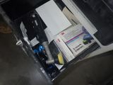 a black box with a bunch of items inside of it