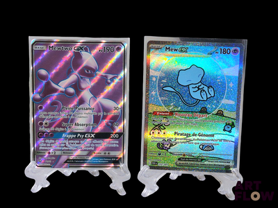 two pokemon cards on display on a black background