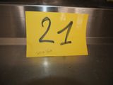 a yellow sign with the number 21 on it