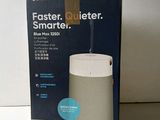 an image of a box of a smart speaker sitting on a table
