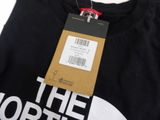 the north face black and white t - shirt with the north face logo on it