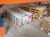 shelves and pallets in a warehouse with pallets stacked on top of each other