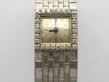 une photo d'une montre-bracelet pour femme sertie de diamants