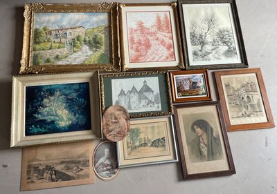 a lot of framed pictures on the wall