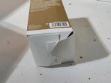 a box that is sitting on the floor next to some boxes