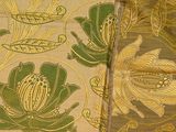 two pieces of fabric with a design on them