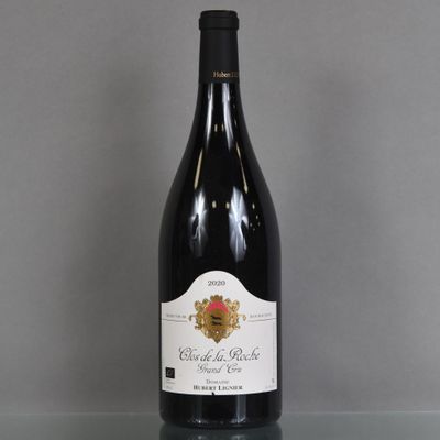 a bottle of wine that is sitting on a table