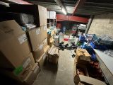 a room filled with lots of boxes and other items