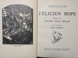 an open book with a picture of a man and a woman in a forest