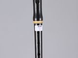side view of a musical instrument showing the body of the instrument
