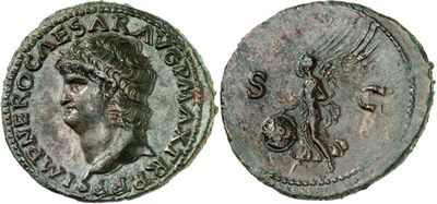 a silver coin with a head of a man and a bird on it