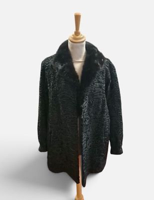 an image of a black coat on a mannequin