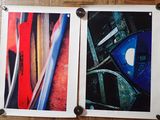 two pictures hanging on the wall of a room