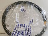 a tennis racquet wrapped in plastic on a table