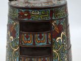 an image of a decorative bell with two animals on it