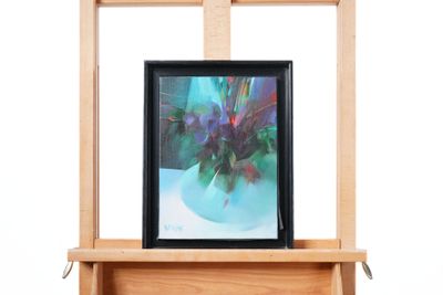 a picture of a painting on a shelf with a picture on it