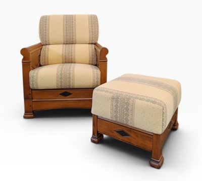 an image of a chair and ottoman with a striped upholstered cover