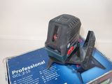 a black and red toy that is on top of a box