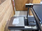 an image of a kitchen with a scale on the counter