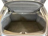 a trunk of a car with the back door open