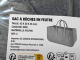 a bag that is sitting on the back of a couch