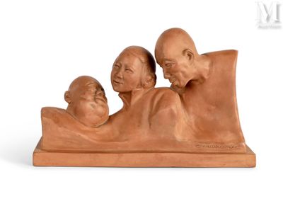 a sculpture of three people laying on a bed