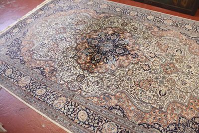 a large oriental rug on the floor in a room