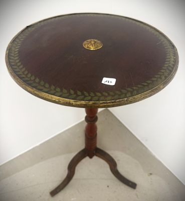 a small table with a wooden top on a stand