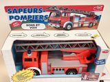 a toy fire truck in the box on the table