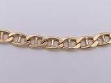 a yellow gold chain bracelet with a flat link