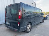 a black van that is parked in a parking lot