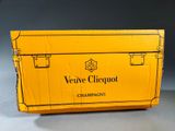 an open box of champagne sitting on top of a table