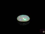 an oplite is shown in the dark with a black background