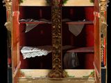 a small wooden cabinet with a mirror on top of it