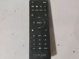 a close up of a remote control on a table