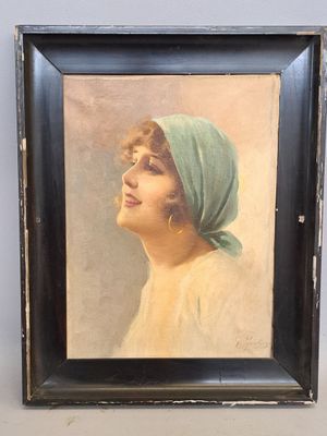 painting of a woman with a green head scarf in a black frame