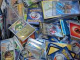a box full of pokemon cards sitting on the floor