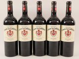 six bottles of red wine are lined up in a row