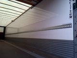 an image of the inside of a truck with the door open